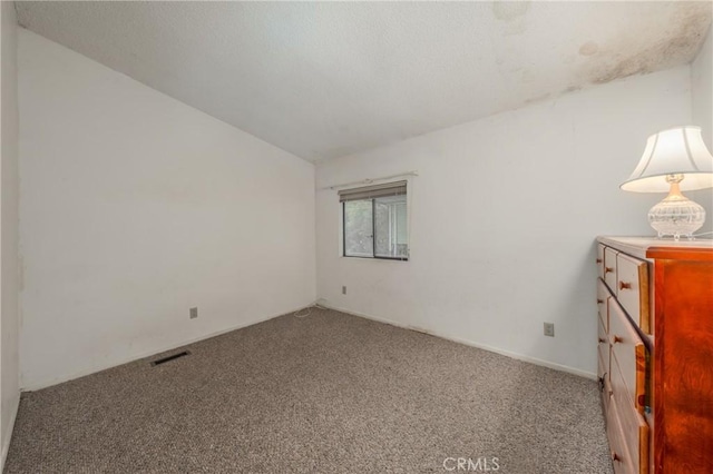 unfurnished bedroom featuring carpet flooring