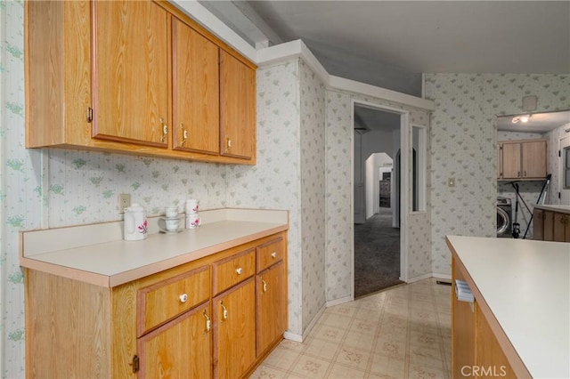 kitchen with washing machine and dryer