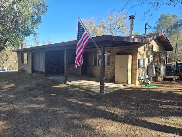 rear view of property with a patio