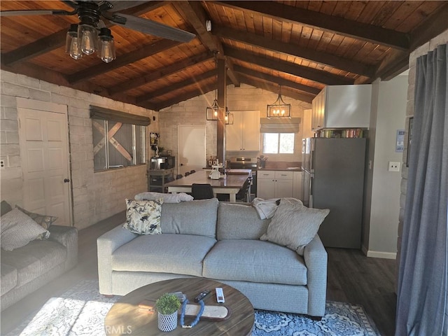 unfurnished living room with hardwood / wood-style flooring, ceiling fan, wood ceiling, and vaulted ceiling with beams