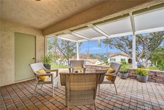 view of patio / terrace featuring a pergola