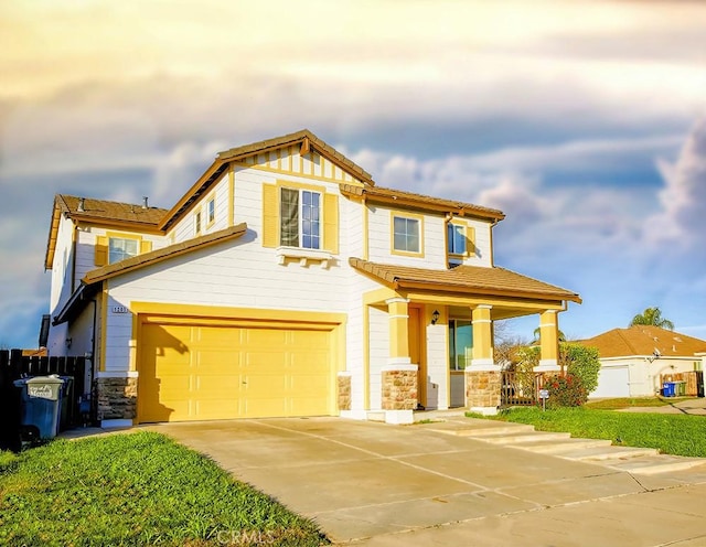 view of front of property with a garage