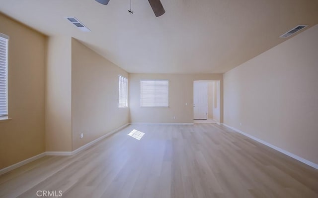 unfurnished room featuring ceiling fan and light wood-type flooring