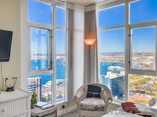 living area featuring a water view