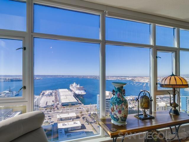 interior space featuring a healthy amount of sunlight and a water view