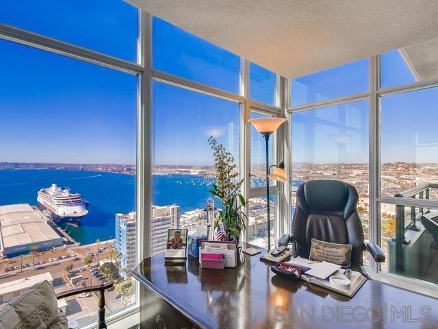 sunroom with a water view