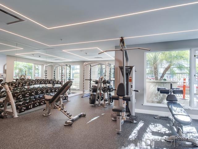 workout area featuring a wealth of natural light