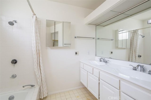 bathroom with vanity, tile patterned flooring, and shower / bath combo