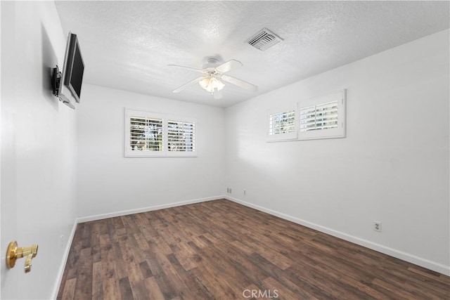 40836 36th St W, Palmdale, CA 93551 - spare room with healthy amount of natural light, a textured ceiling, a ceiling fan, wood finished floors, and baseboards
