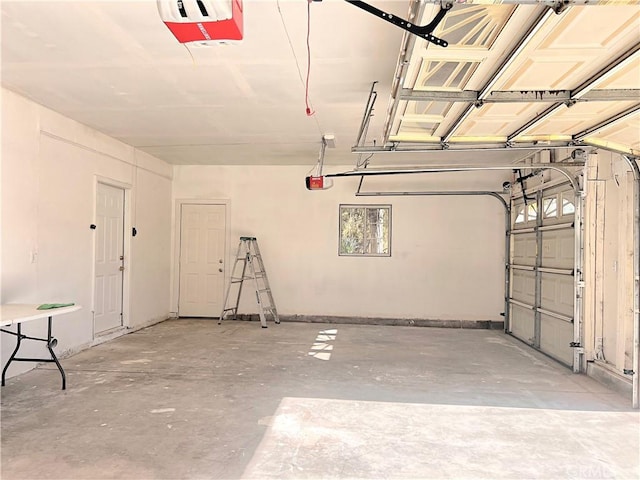 garage featuring a garage door opener