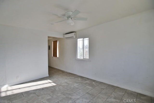 empty room featuring ceiling fan and an AC wall unit