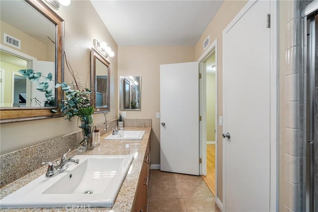 bathroom featuring vanity and tile patterned floors