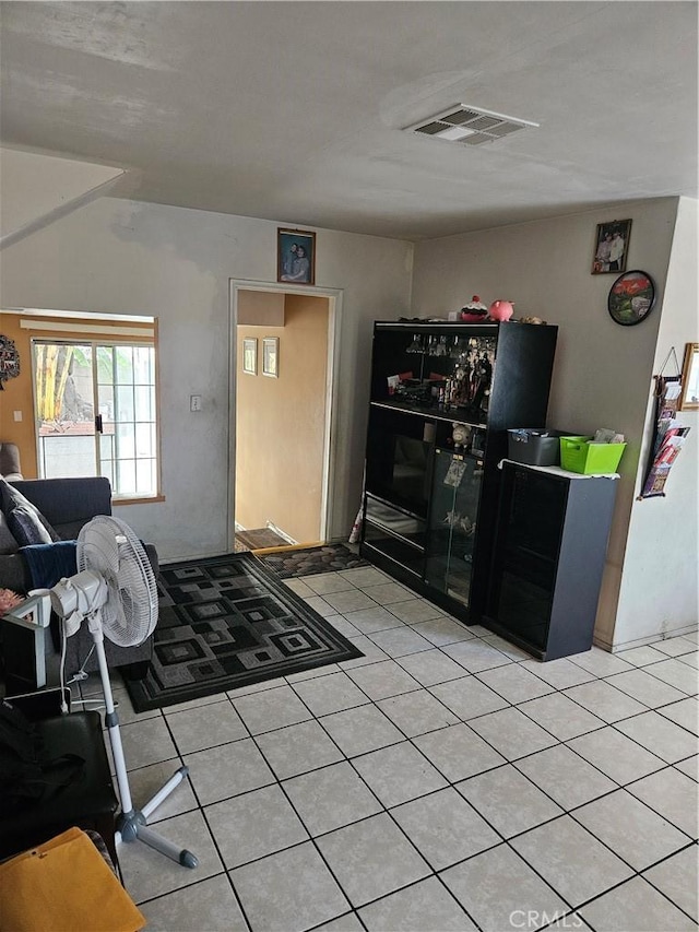 interior space with light tile patterned floors