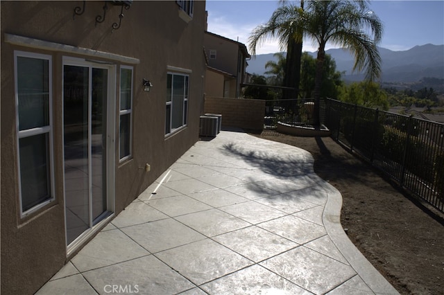 view of patio / terrace featuring a mountain view