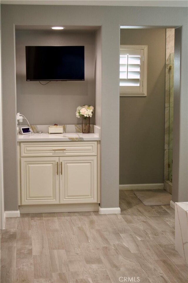 bathroom featuring hardwood / wood-style floors