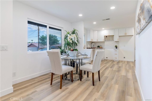 dining area featuring light hardwood / wood-style floors