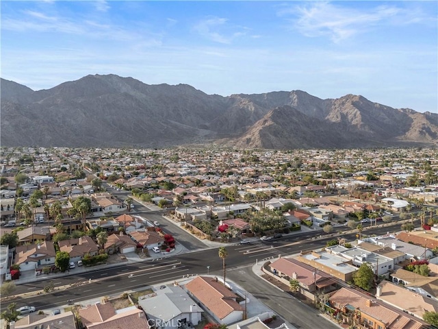 drone / aerial view featuring a mountain view