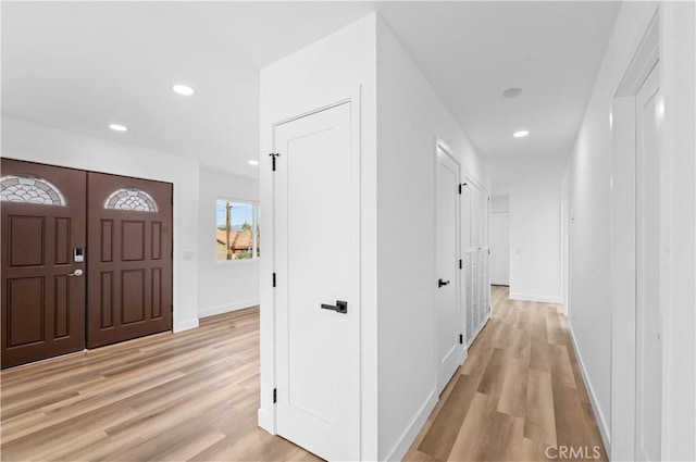 entrance foyer featuring light wood-type flooring