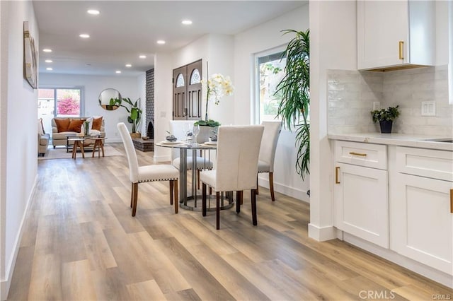 dining room featuring light hardwood / wood-style flooring