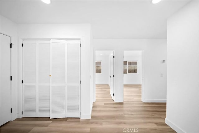 hall featuring light hardwood / wood-style floors