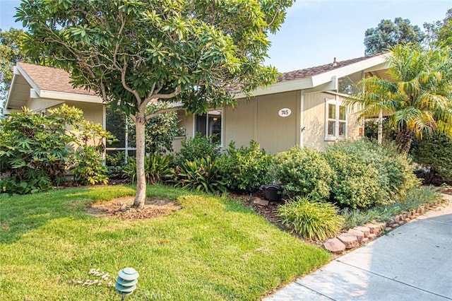 view of front of home with a front yard