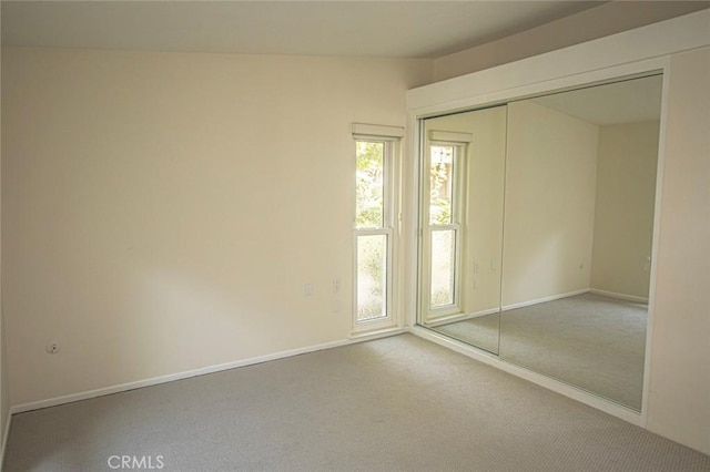 spare room featuring carpet flooring