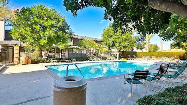 view of pool featuring a patio