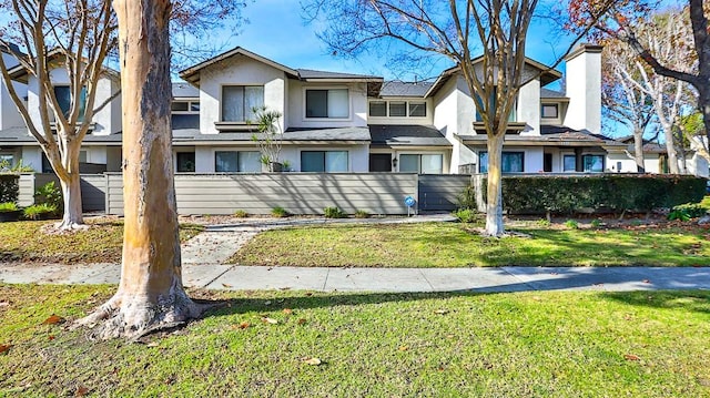 view of front of house with a front lawn