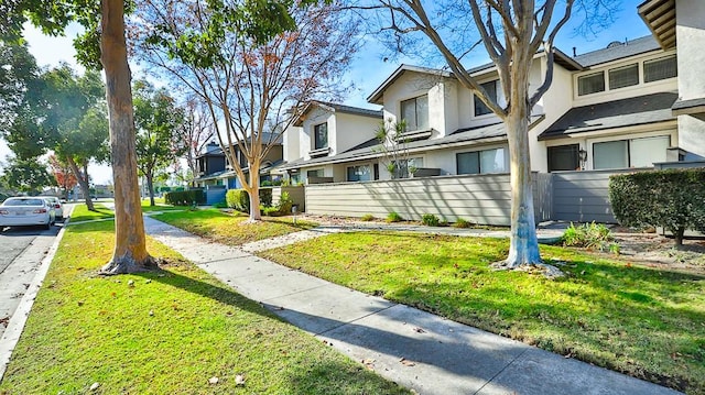 exterior space featuring a front lawn