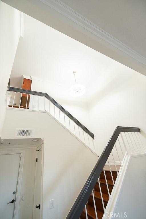 stairs with crown molding