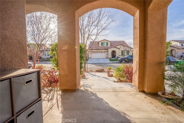 view of patio with a garage