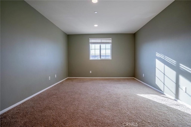 empty room featuring carpet floors