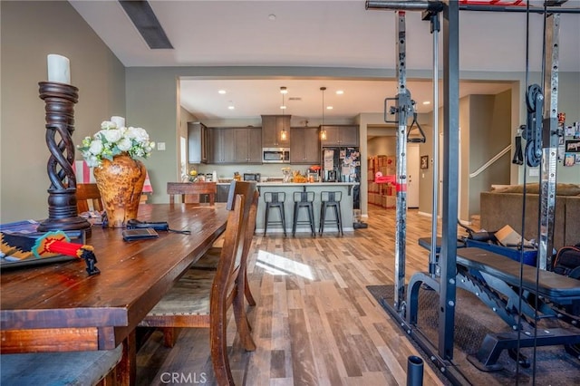 dining room with light hardwood / wood-style floors