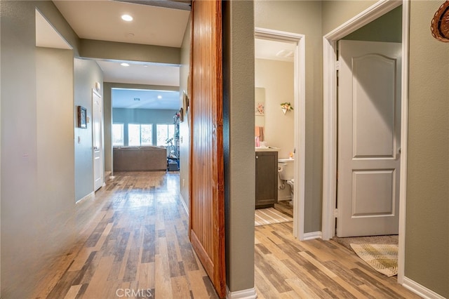 hallway featuring light hardwood / wood-style floors