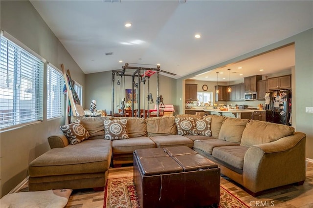 living room with vaulted ceiling