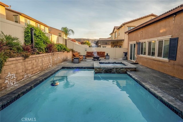 view of swimming pool featuring a fire pit