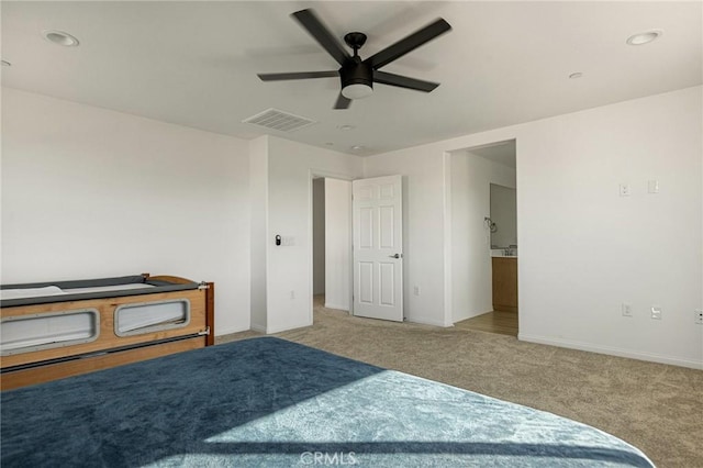 carpeted bedroom featuring ceiling fan