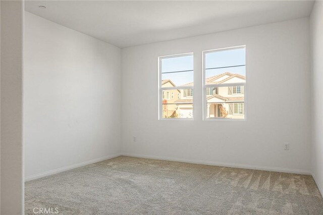 view of carpeted spare room