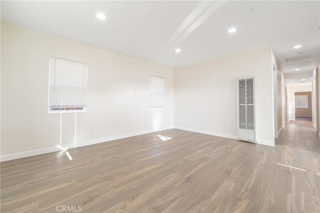 empty room featuring hardwood / wood-style floors