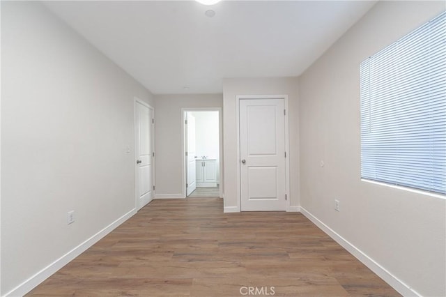 corridor featuring light hardwood / wood-style flooring