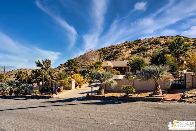 view of front of home with a mountain view