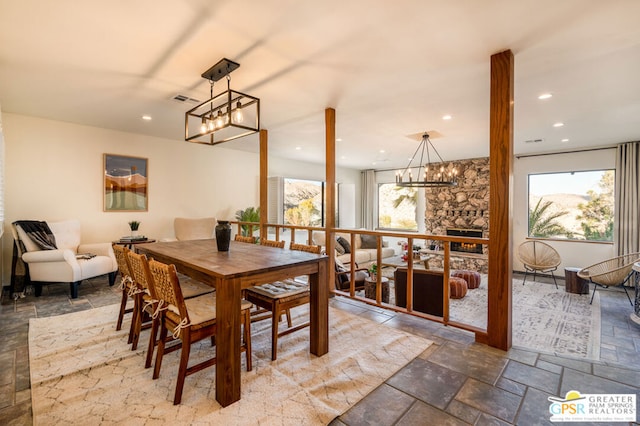 dining room featuring a fireplace