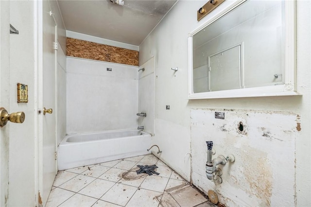 bathroom with tile patterned floors and shower / bathing tub combination