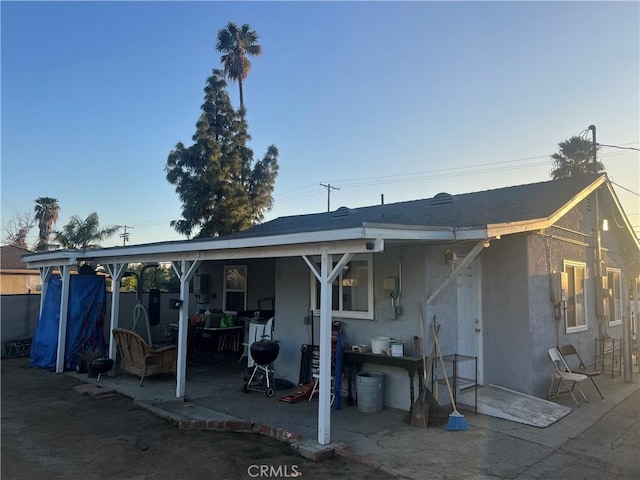 rear view of house featuring a patio