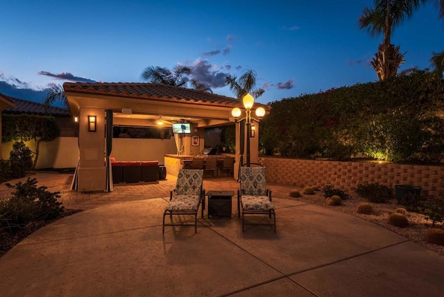 patio terrace at dusk with a gazebo