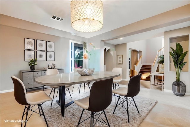 dining room featuring an inviting chandelier