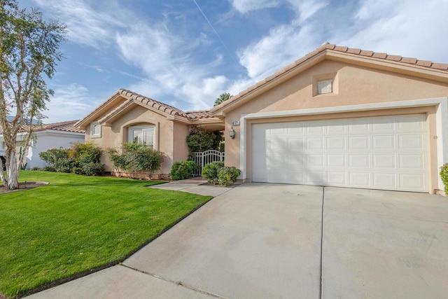 view of front facade featuring a front lawn and a garage