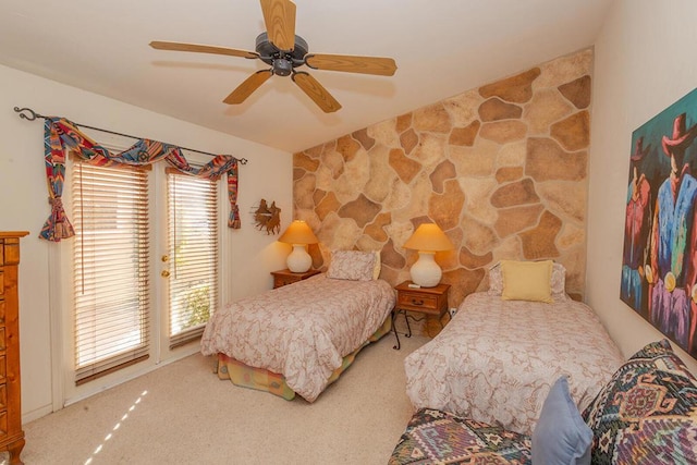 bedroom featuring ceiling fan and carpet floors