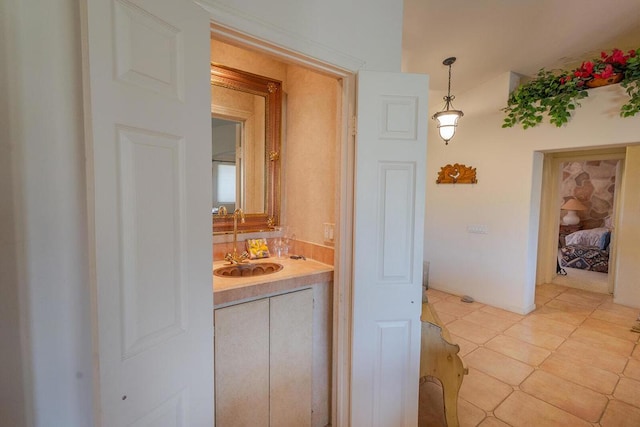 bathroom with tile patterned floors and sink