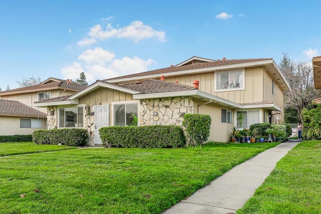 view of property with a front lawn